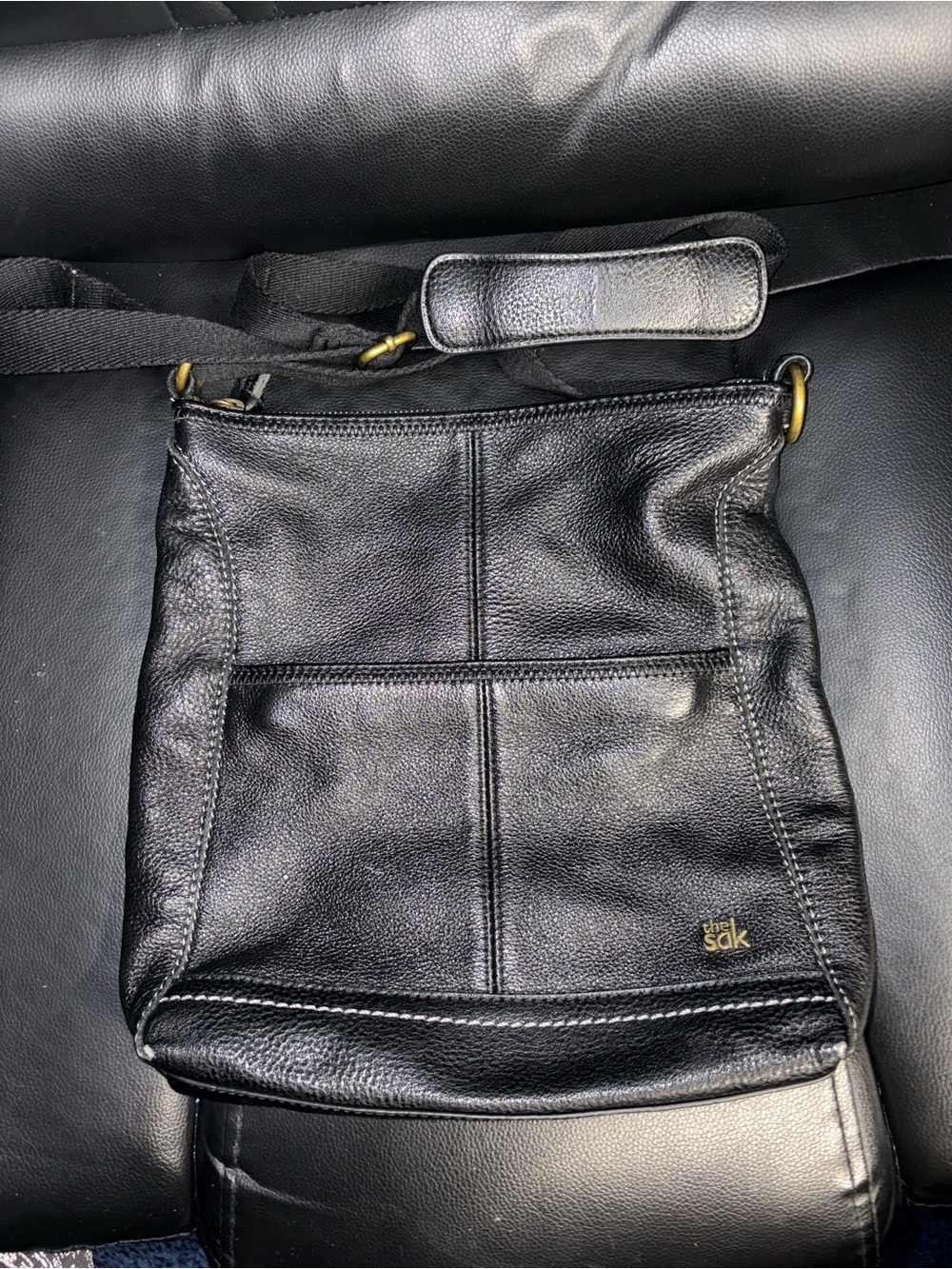The Sak Black Leather Messenger Crossbody with Gold-Tone Accents